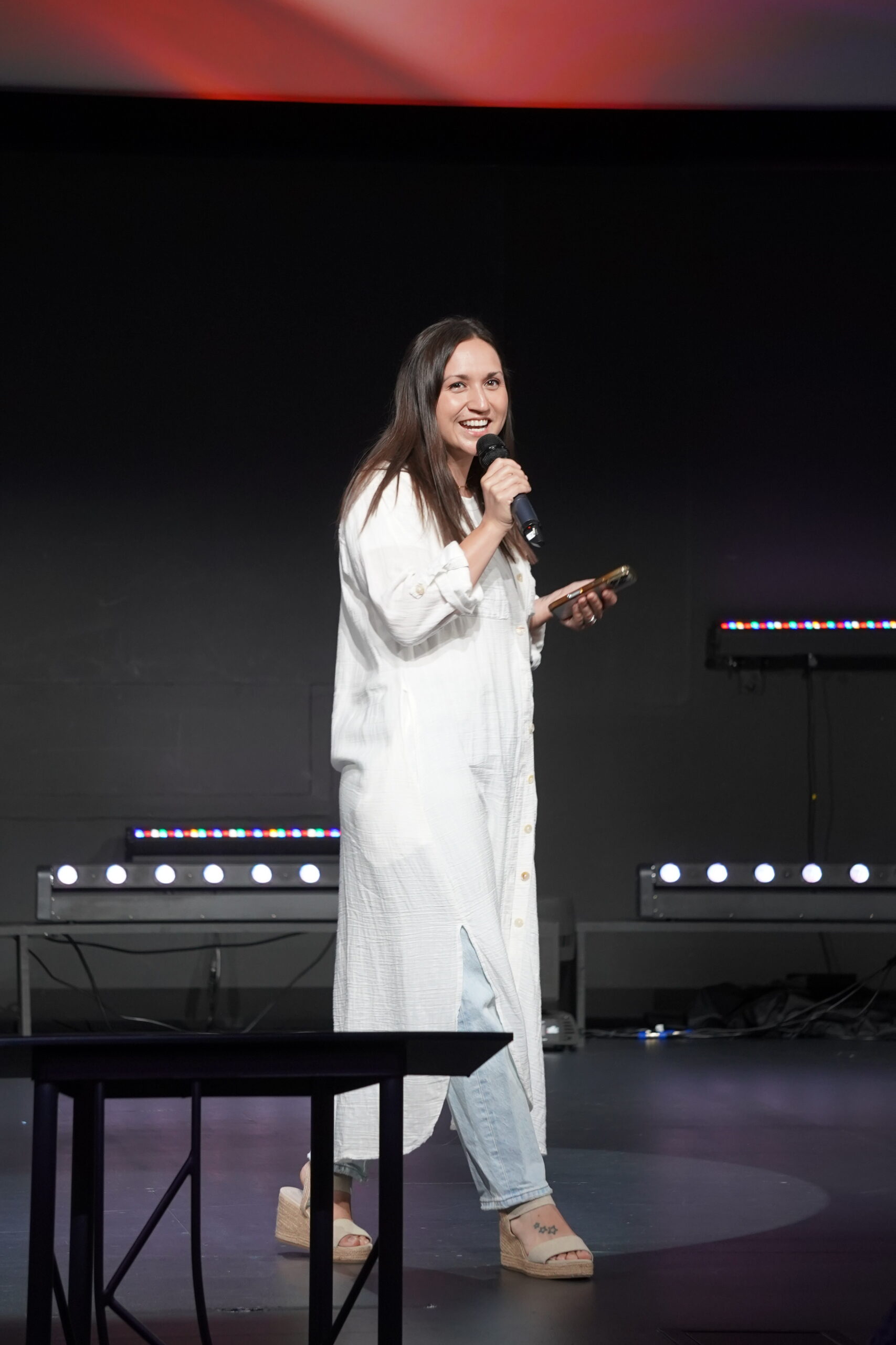 Cassie Littel speaking on stage