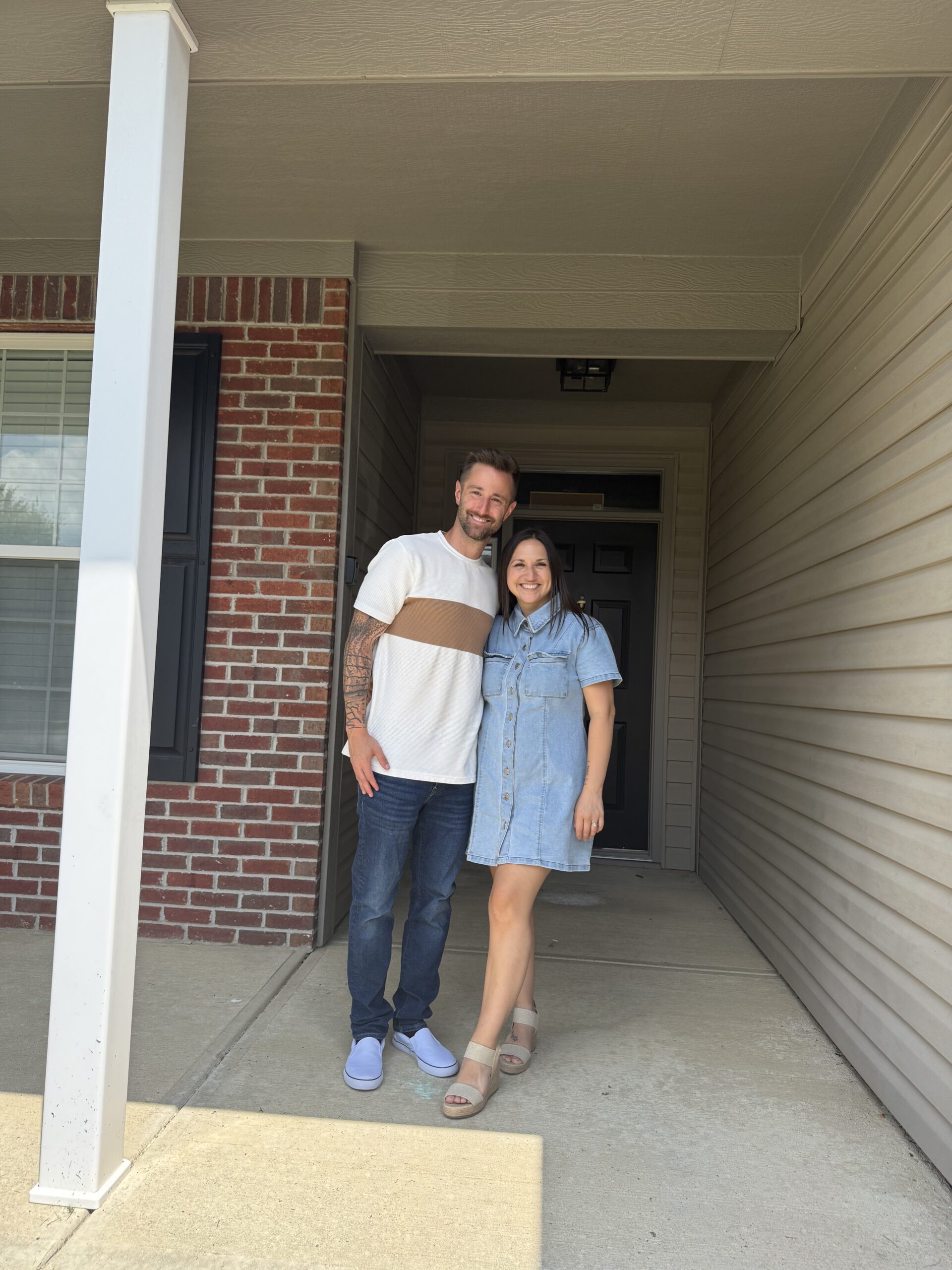 Kyle and Cassie Littel on their front porch
